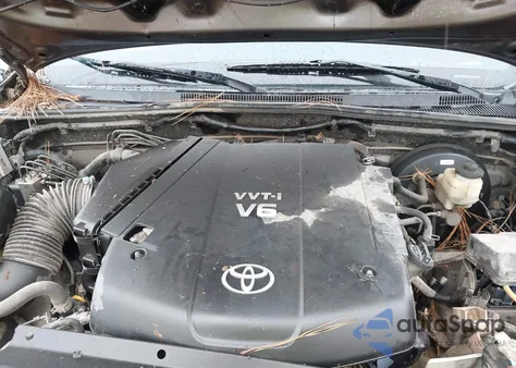 2014 Toyota Tacoma Base V6 z USA, uszkodzony, nr VIN 5TFUU4EN8EX098615